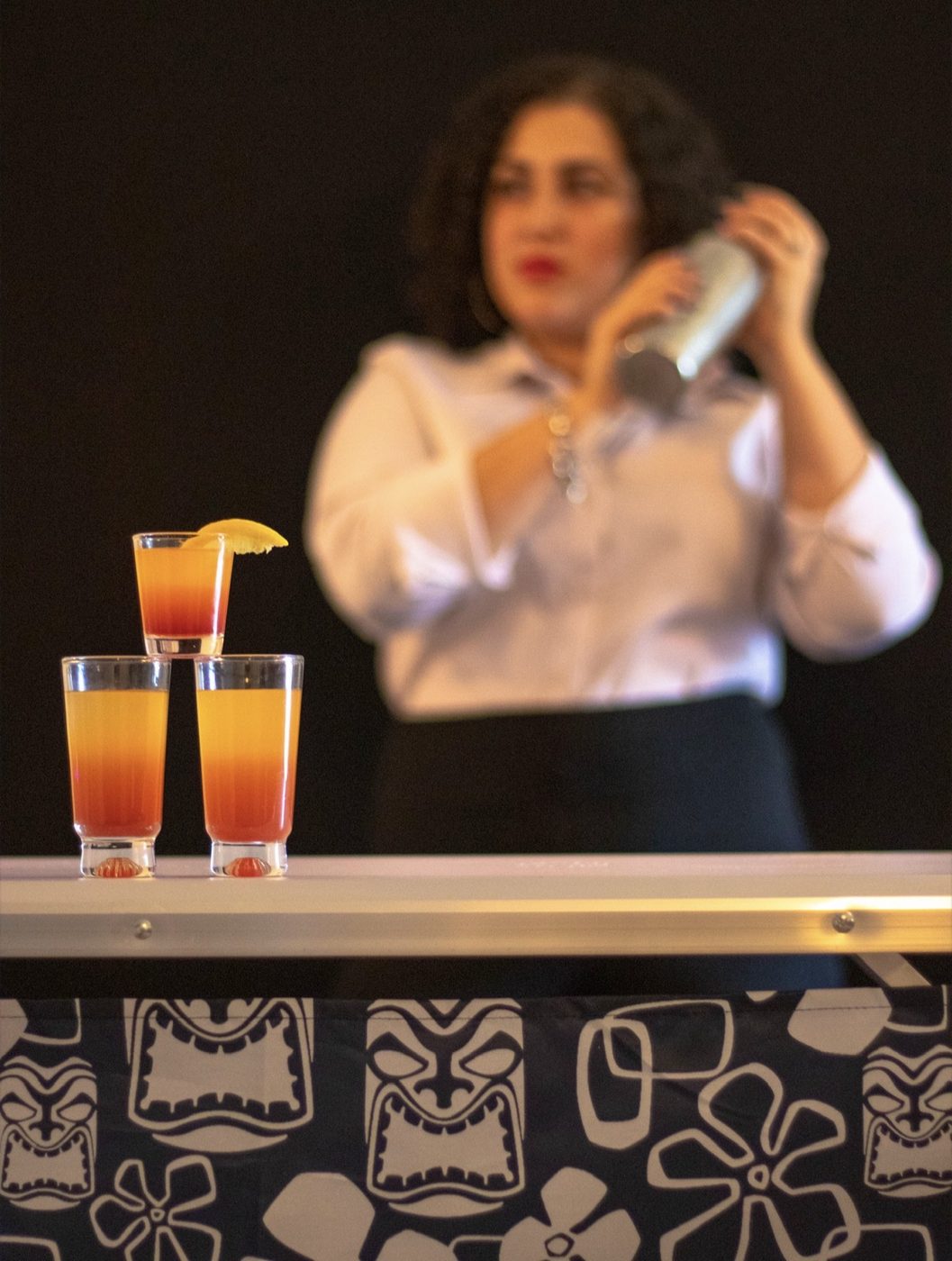 Bartender shaking cocktails