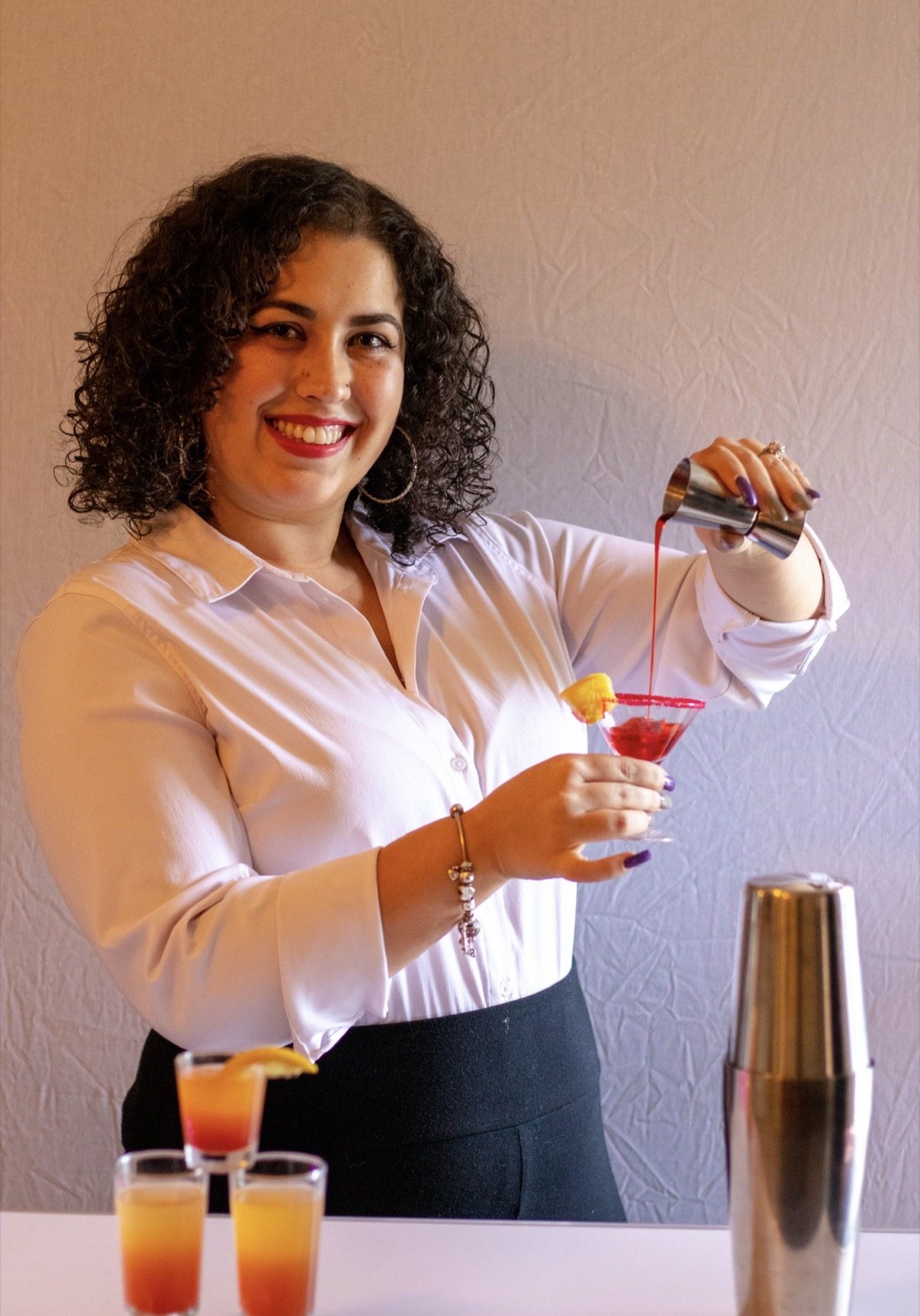 Tipsy Server bartender preparing a cocktail